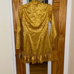 I am selling a midi gold dress. Brand: Boohoo